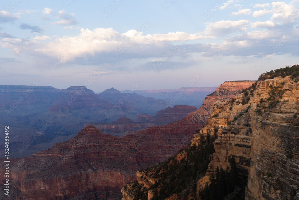 Fototapeta premium Grand Canyon National Park at sunset in July with cloudy sky