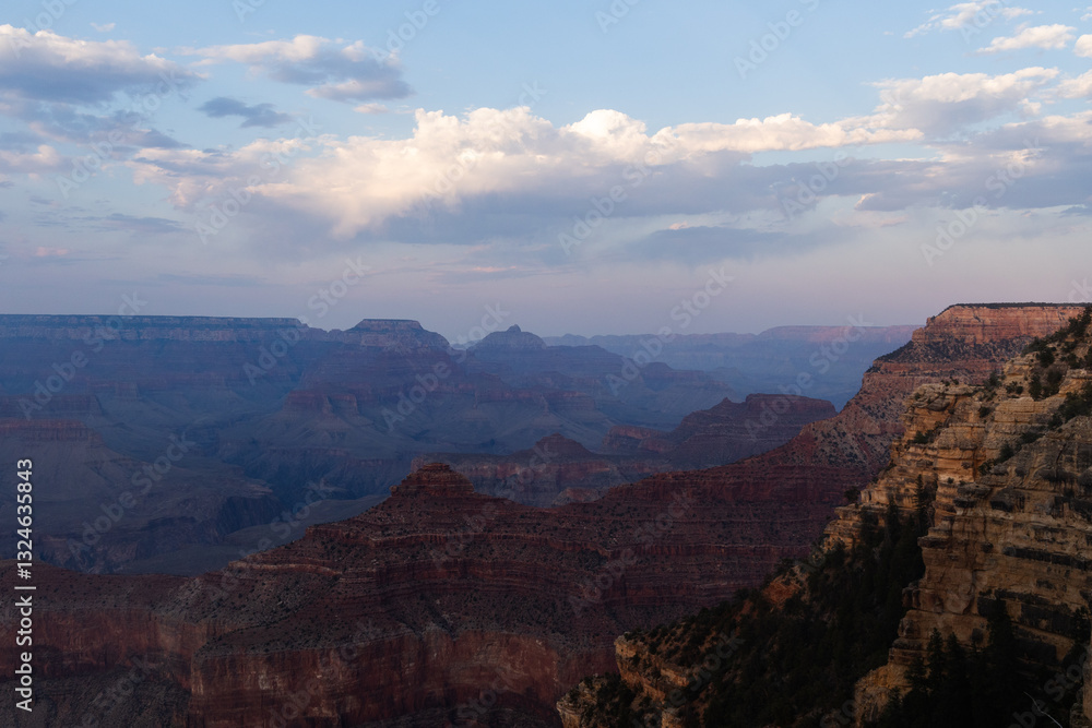 Grand Canyon National Park at sunset in July with cloudy sky Grand Canyon National Park at sunset in July with cloudy sky