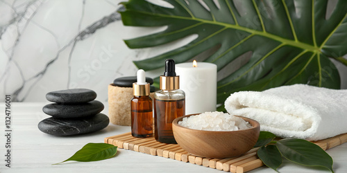 Obraz na płótnie Serenity and Relaxation: Aromatherapy Oils, Candles, and Spa Elements on a Natural Background with Leaves and Stones for Home Wellness Spaces w salonie