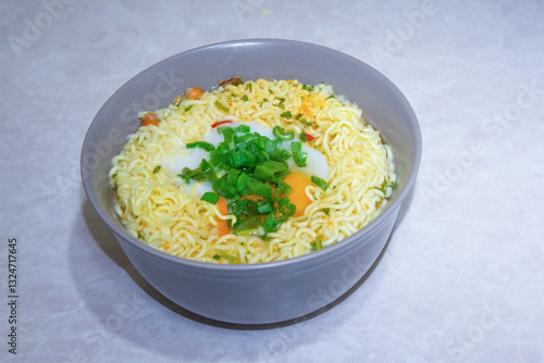 Isolated Close up ramen soup with onion and egg 