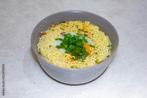 Isolated Close up ramen soup with onion and egg 