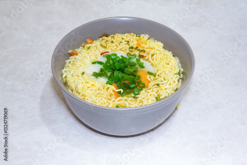 Isolated Close up ramen soup with onion and egg 