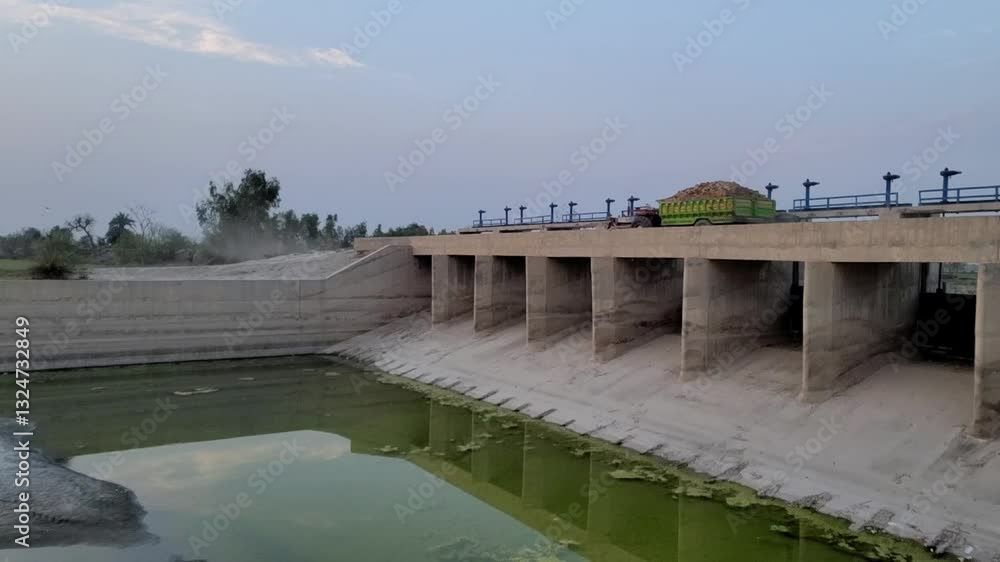 Rural Irrigation Dam and Water Flow Structure – Sustainable Water Management in 4K Slow Motion Clip Rural Irrigation Dam and Water Flow Structure – Sustainable Water Management in 4K Slow Motion Clip