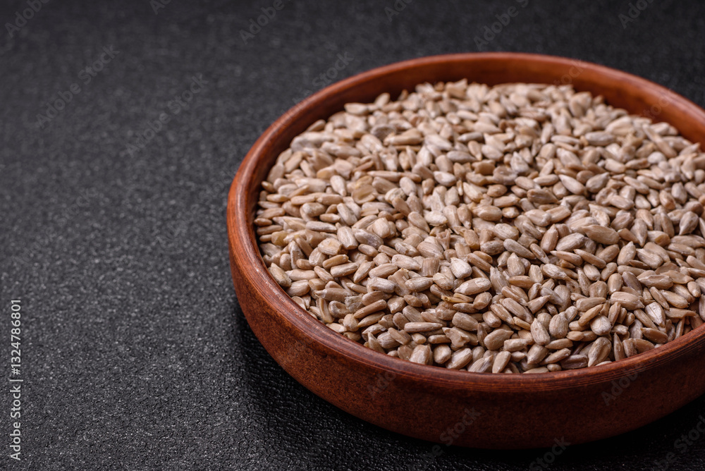 Peeled sunflower seeds in a bowl, an ingredient for making vegetarian food Peeled sunflower seeds in a bowl, an ingredient for making vegetarian food
