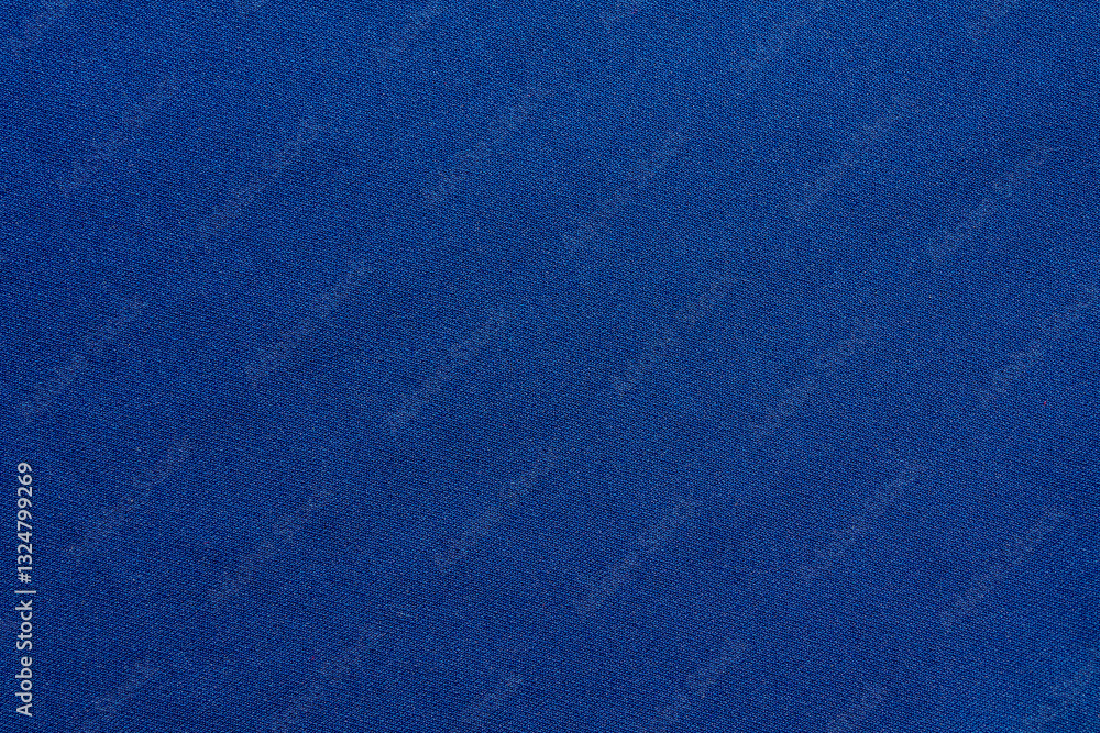 A close-up shot of smooth blue canvas fabric, perfect for use as a background or texture in design projects A close-up shot of smooth blue canvas fabric, perfect for use as a background or texture in design projects