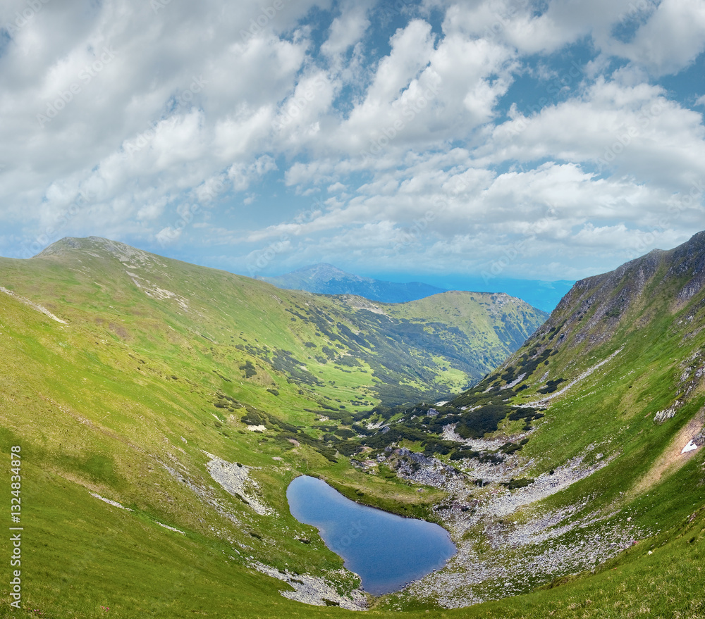 Alpine lake Brebeneckul on summer mountain ravine (Ukraine, Chornogora Ridge, Carpathian Mountains).