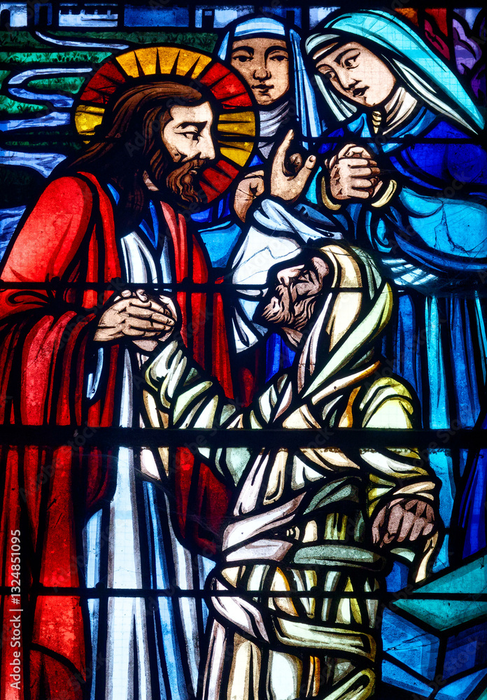 Obraz premium Stained glass (1930) of Jesus Miracle: the Resurrection of Lazarus.