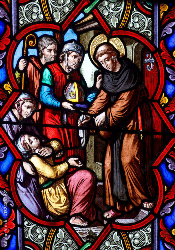 Fototapeta premium Stained glass (19th century) of Saint Martin of Tours caring for the poor. Saint of the Roman Catholic Church..