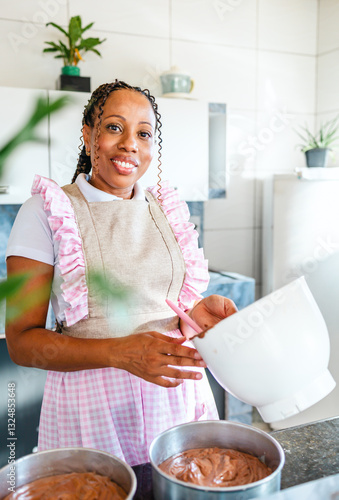 woman pastry chef mixing ingredients for cake