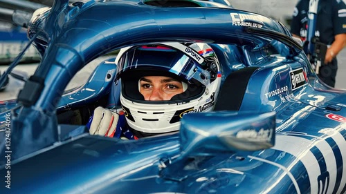 portrait of a female racer in a sports car