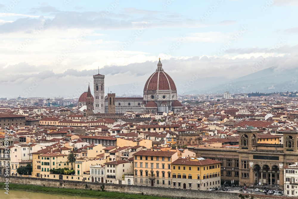 Fototapeta premium A Florence Firenze city in Italy Toscana view with a river running through it