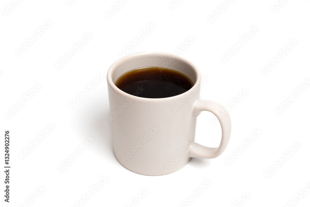 White ceramic mug filled with coffee on isolated white background. Close up of hot drink. Morning, relaxation, and beverage concept. Copy space White ceramic mug filled with coffee on isolated white background. Close up of hot drink. Morning, relaxation, and beverage concept. Copy space