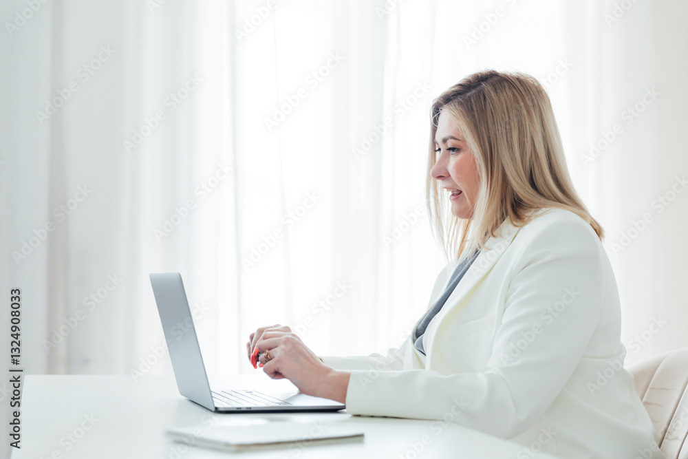 Business woman working online on laptop in office training Business woman working online on laptop in office training