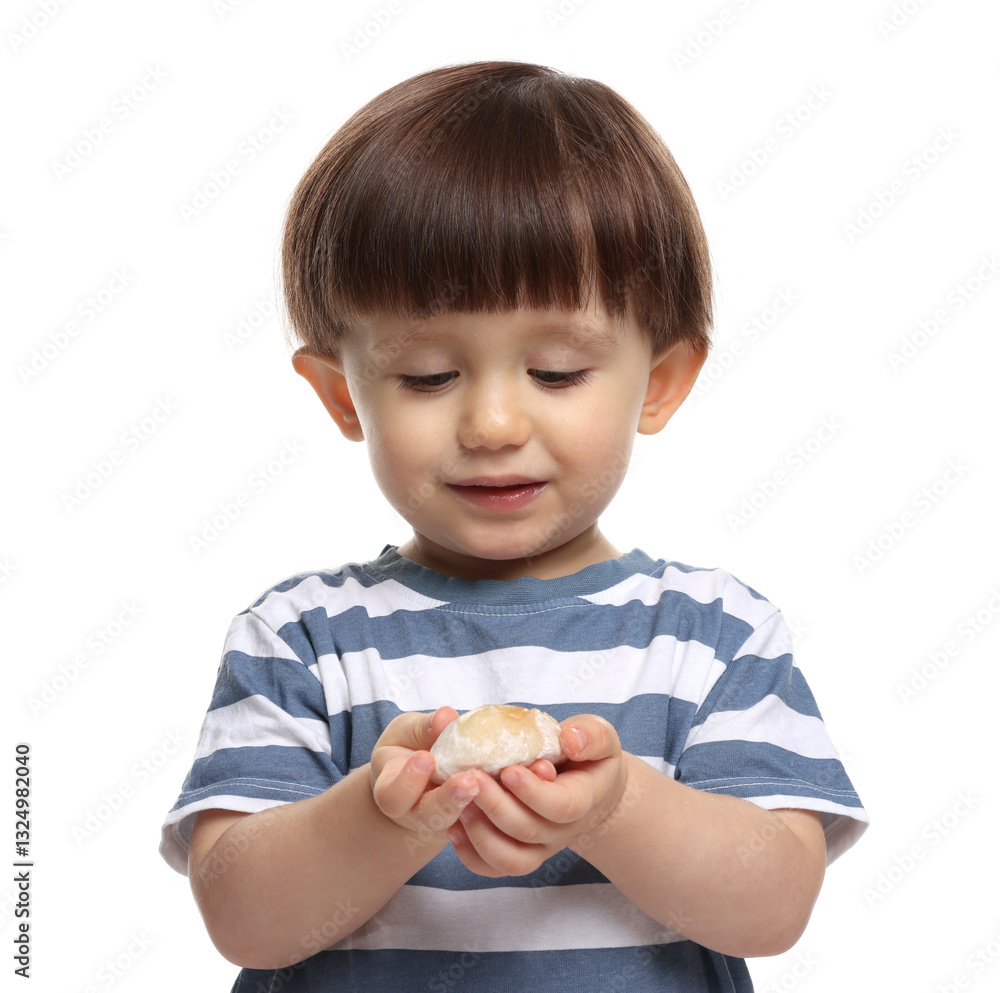 Cute little child with tasty mochi on white background Cute little child with tasty mochi on white background