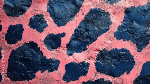 Abstract texture featuring bold pink and dark blue shapes resembling animal spots, creating a vibrant and dynamic visual effect