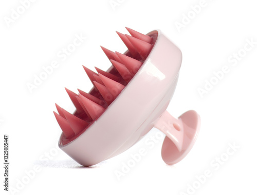 Pink scalp massager brush on white background isolation