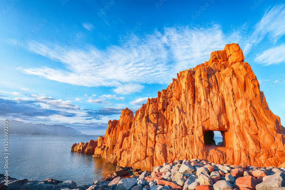 Exciting sunset view of Red Rocks (Rocce Rosse) in Arbatax.