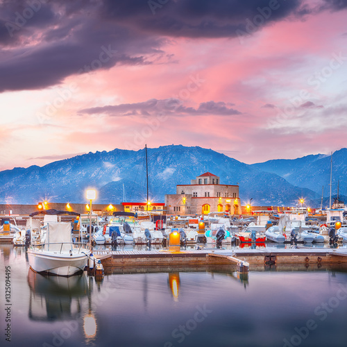 Obraz na płótnie Remarkable sunset view on boats in beautiful marina of Villasimius. w salonie