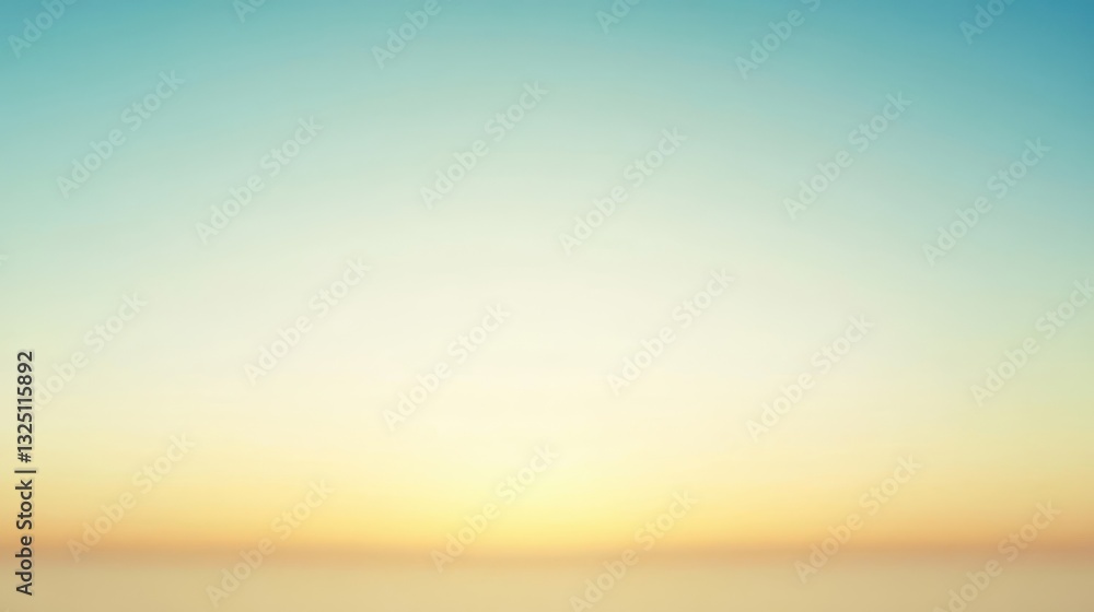 Fototapeta premium A gradient sky transitioning from blue to yellow and orange hues