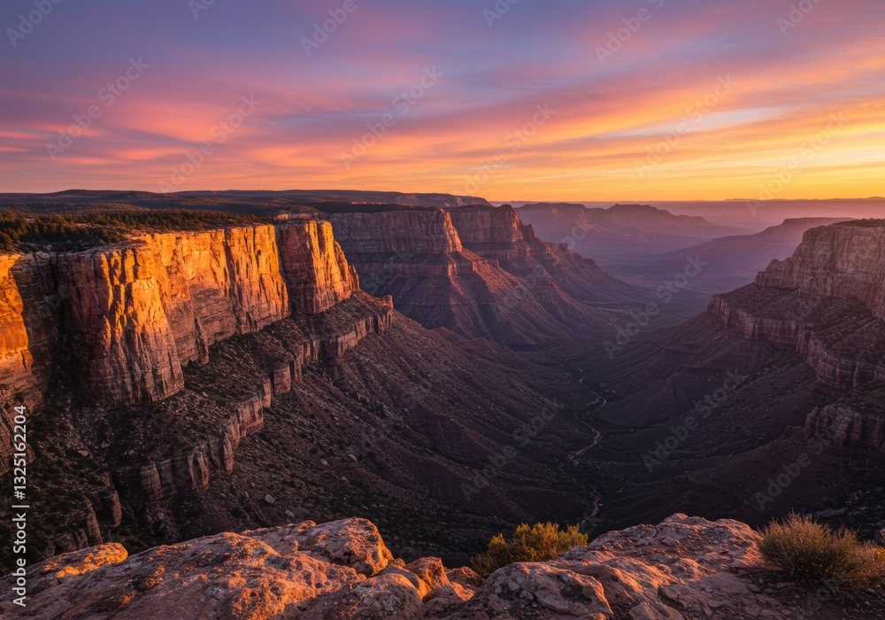 Obraz premium Majestic grand canyon sunset with vibrant sky and deep valleys