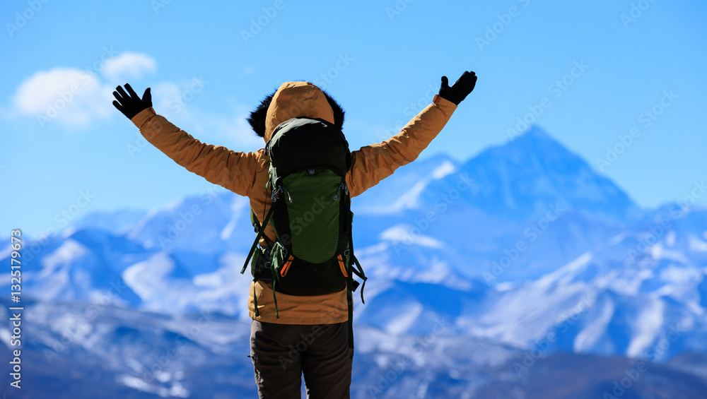 Successful woman hiker open arms to Mount Everest in Tibet, China Successful woman hiker open arms to Mount Everest in Tibet, China
