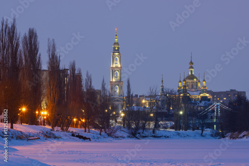 Obraz na płótnie Cathedral of the Saviour's Transfiguration, Tambov city, Tambov region, Russia. Evening winter landscape with a church and a high bell tower. Night illumination of buildings. Architectural landmarks. w salonie