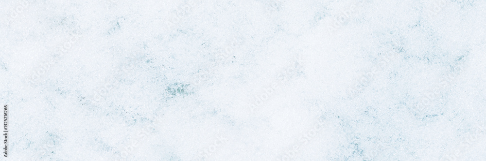 Natural snow texture. The surface of clean fresh snow. Snowy ground. Wide panoramic winter background with snow patterns. Perfect for Christmas and New Year design. Closeup top view.