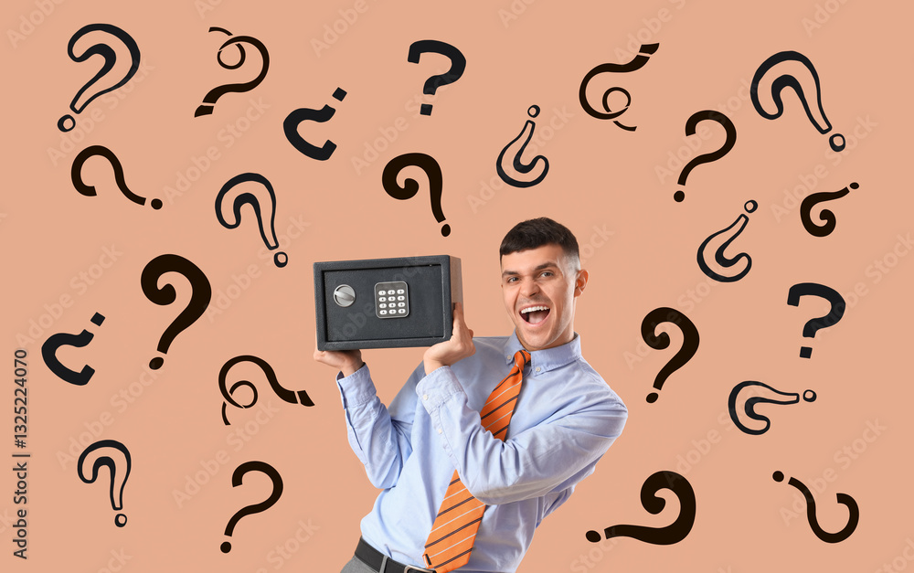 Happy young man with safe box on brown background Happy young man with safe box on brown background