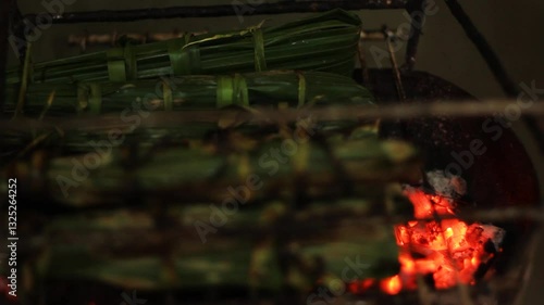 cassava pamonha rolled in banana leaf. Typical Brazilian food known as carimã