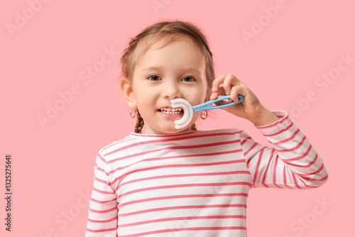 Happy little girl with toot...