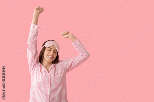 Young woman in pajamas and ...