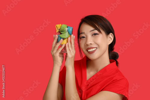 Young Asian woman with colo...