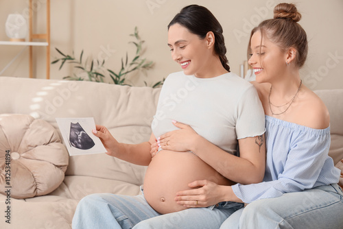 Young pregnant lesbian coup...