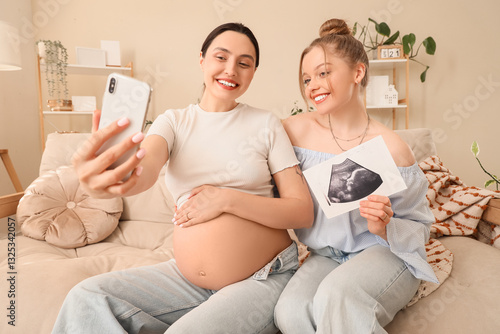 Young pregnant lesbian coup...