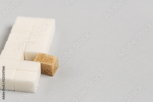 Brown and white sugar cubes...