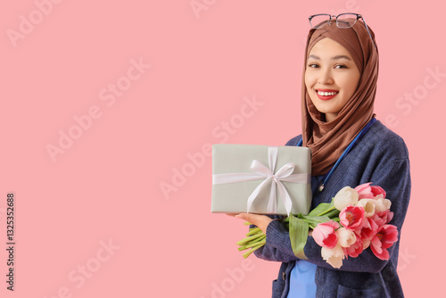 Female Muslim doctor with g...