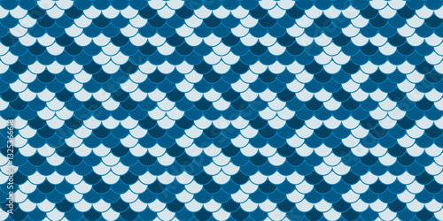 Seamless pattern of overlapping scales in calming blue hues.  Evokes tranquility, water, and nature.