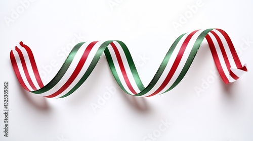 Classic striped Christmas ribbon twirling elegantly a white background forming soft festive curves