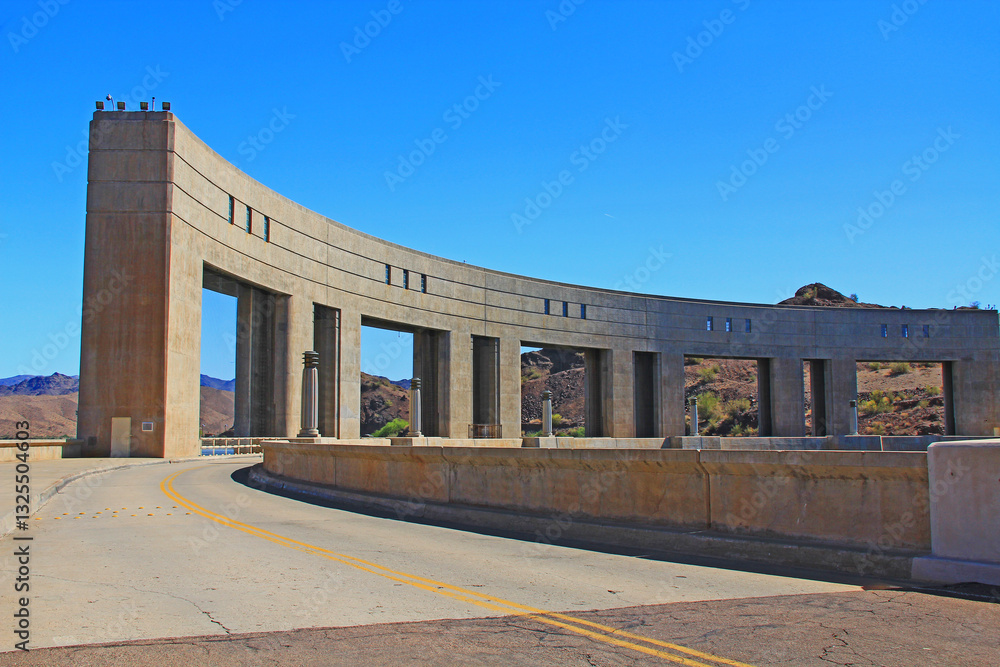 Obraz premium Hydroelectric Power Parker Dam on the Colorado River and Lake Havasu, in Parker Dam, California, USA with blue sky copy space.