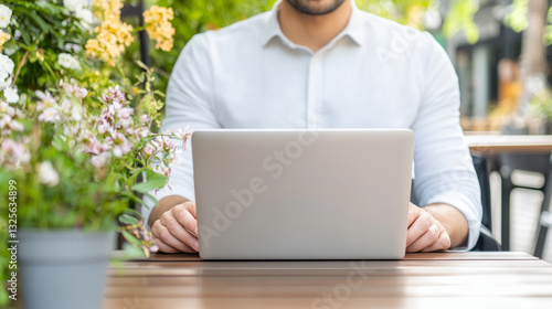 Man at the desk in front of...