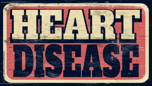 Aged and worn heart disease sign on wood