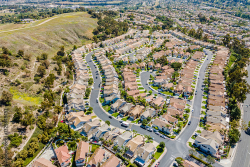 Chino Hills, California – October  22, 2024: Aerial drone village community photo toward Chino Hills Pkwy and Eucalyptus Ave for homes, houses, streets, and hills
