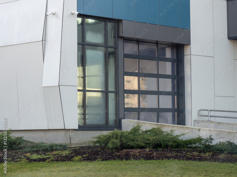 Fototapeta premium Garage rolling gates. Parking entrance gates. Warehouse entrance. Modern architectural trends