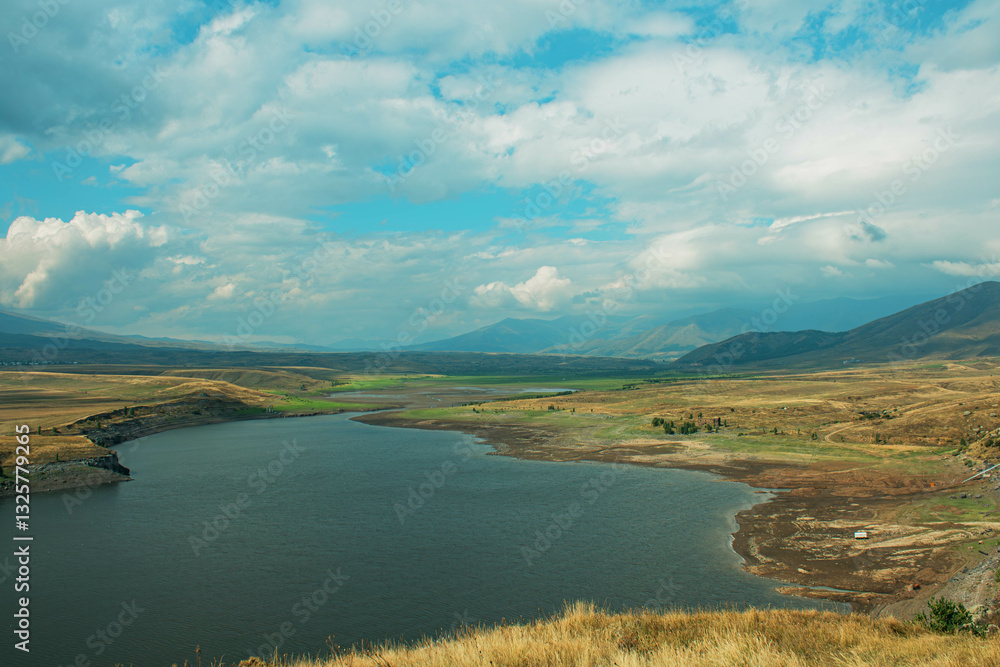 landscape with lake, clouds and mountains landscape with lake, clouds and mountains