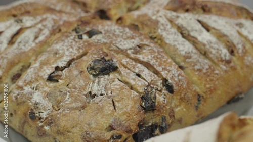 Pan close up shot of fresh baked bread loafs. Bakery concept