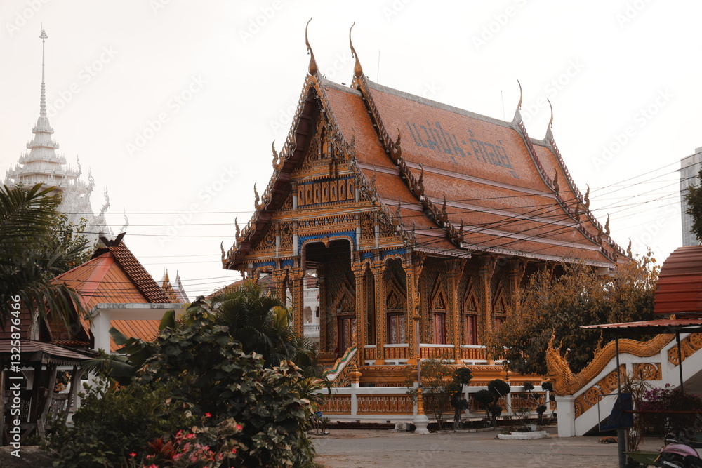 Naklejka premium A Beautiful and Traditional Thai Temple Featuring Ornate and Detailed Architecture