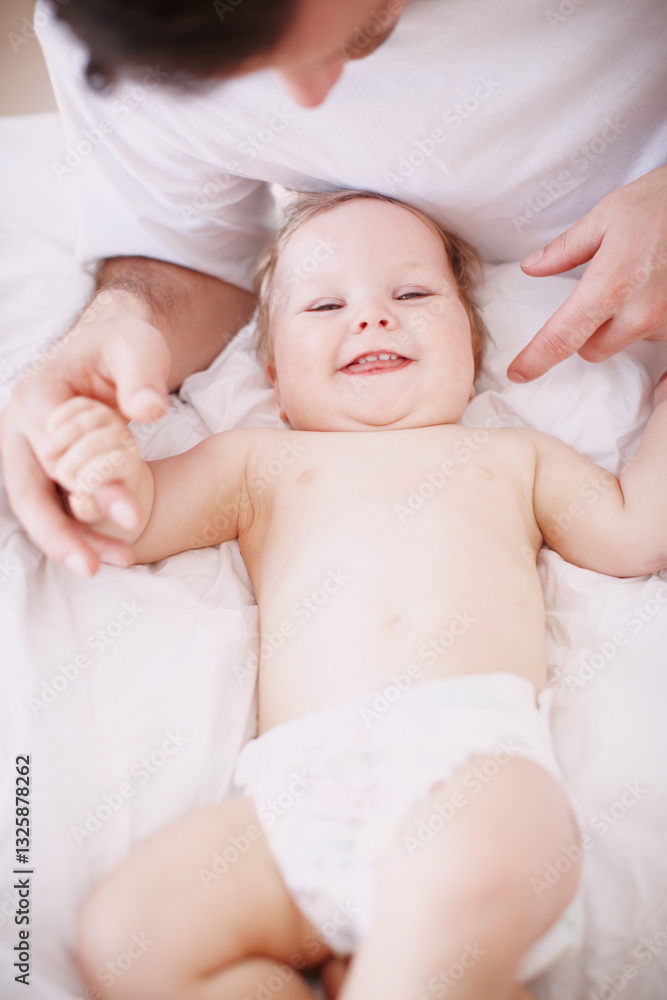 Home, bed and father with baby in portrait, bonding together and child development with growth. House, family and dad with infant kid for playful, support and relationship with laughing from above Home, bed and father with baby in portrait, bonding together and child development with growth. House, family and dad with infant kid for playful, support and relationship with laughing from above