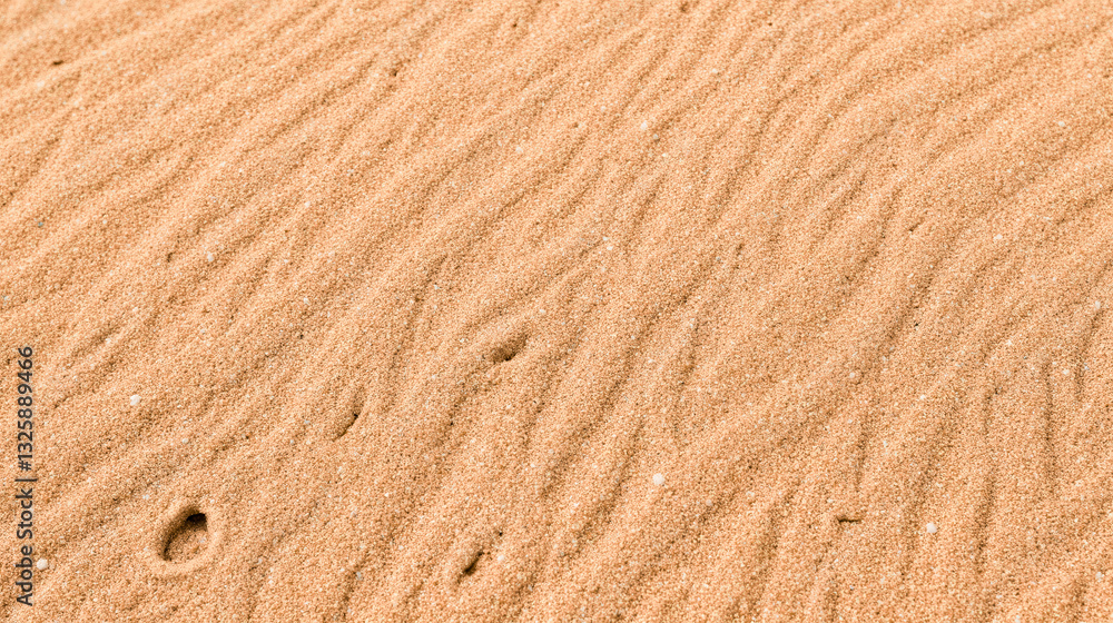 Golden sand close-up with small ripples and pebbles, textured beach surface in warm yellow orange tones, peaceful nature, sunny summer background Golden sand close-up with small ripples and pebbles, textured beach surface in warm yellow orange tones, peaceful nature, sunny summer background