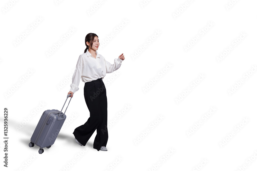 Cheerful young Asian woman holding suitcase with walking to the front, isolated on white background. Concept tourist holiday trip, cut out Cheerful young Asian woman holding suitcase with walking to the front, isolated on white background. Concept tourist holiday trip, cut out