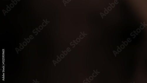 A serene evening scene of a lone figure standing on a beach, gazing at the sunset, waves crashing softly